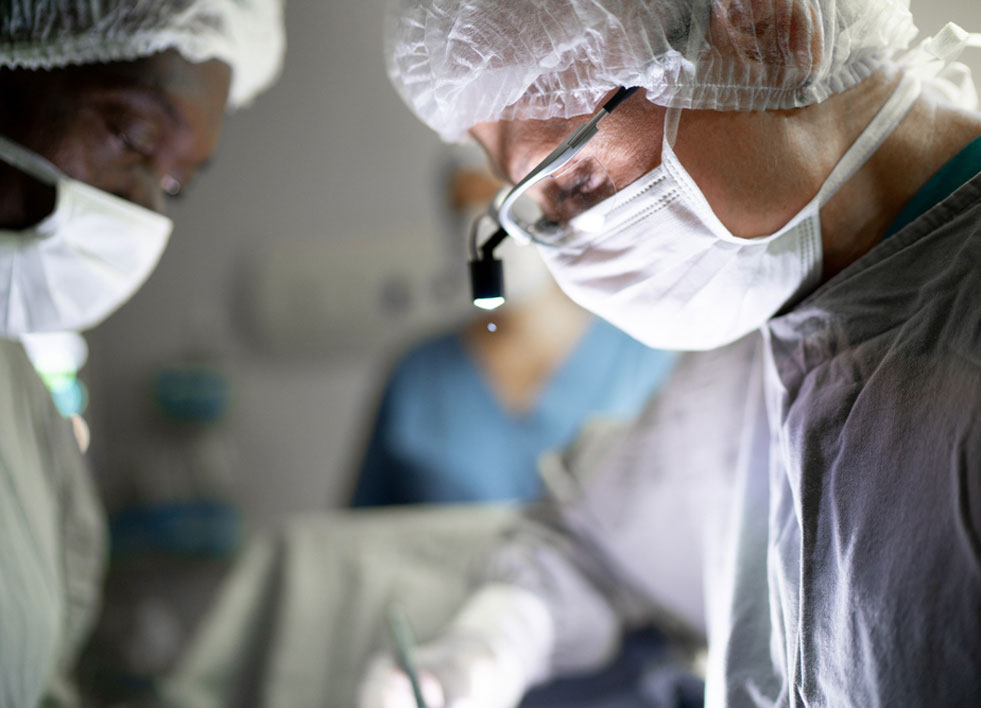 Surgeons operating